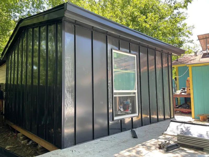 Black standing seam metal wall panels for Roof Inspection in Centralia
